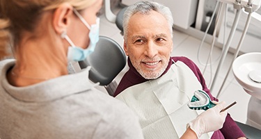 An older man getting impressions for dentures